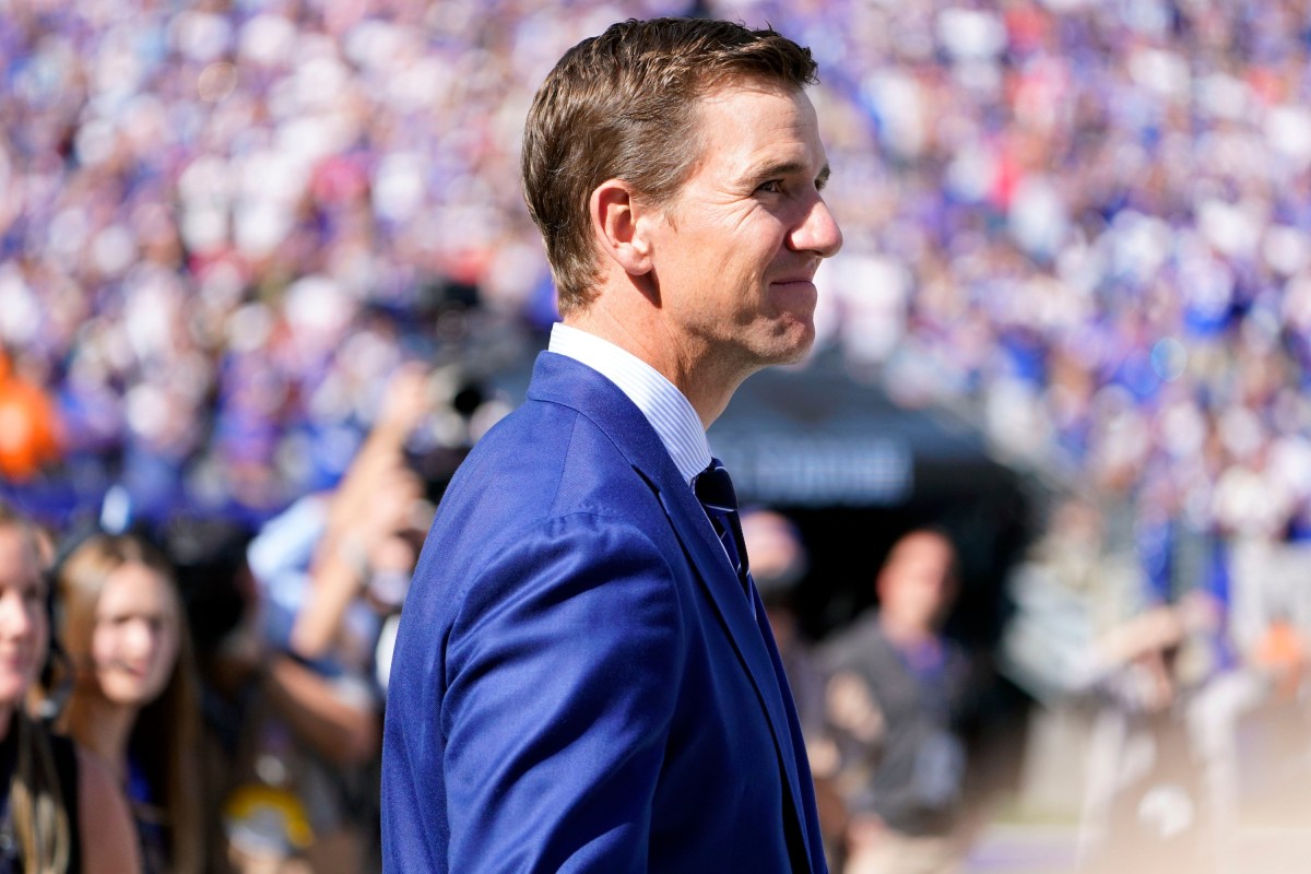 Former New York Giants quarterback Eli Manning walks onto the field for the Ring of Honor ceremony at MetLife Stadium on Sunday, Sept. 26, 2021, in East Rutherford.